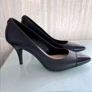 Michael kors women’s leather heels.